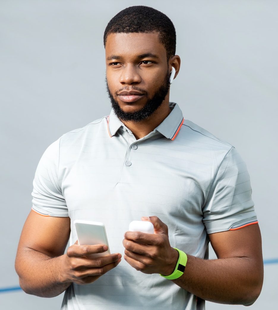 Sportive bearded young man in a gray t-shirt